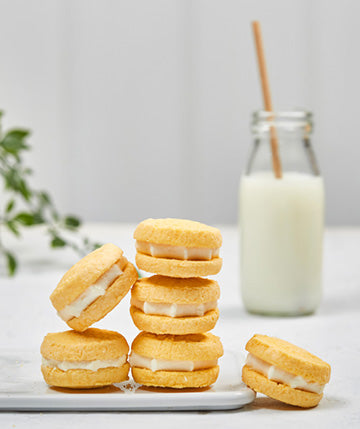 Load image into Gallery viewer, Gluten Free Lemon Cream Melting Moments 32g (80 Single Serves)